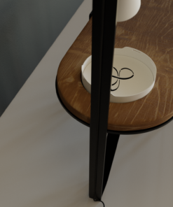 Zoom sur le plateau blanc de la table basse ovale hommage avec option plateau bois et option lampe en porcelaine biscuit