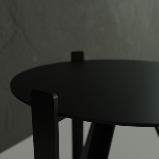 Zoom sur la table basse hommage ronde de diamètre 500 mm. Matière : acier thermolaqué texture fine noir